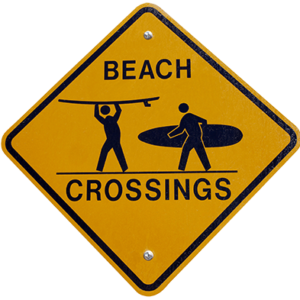 surfer crossing sign